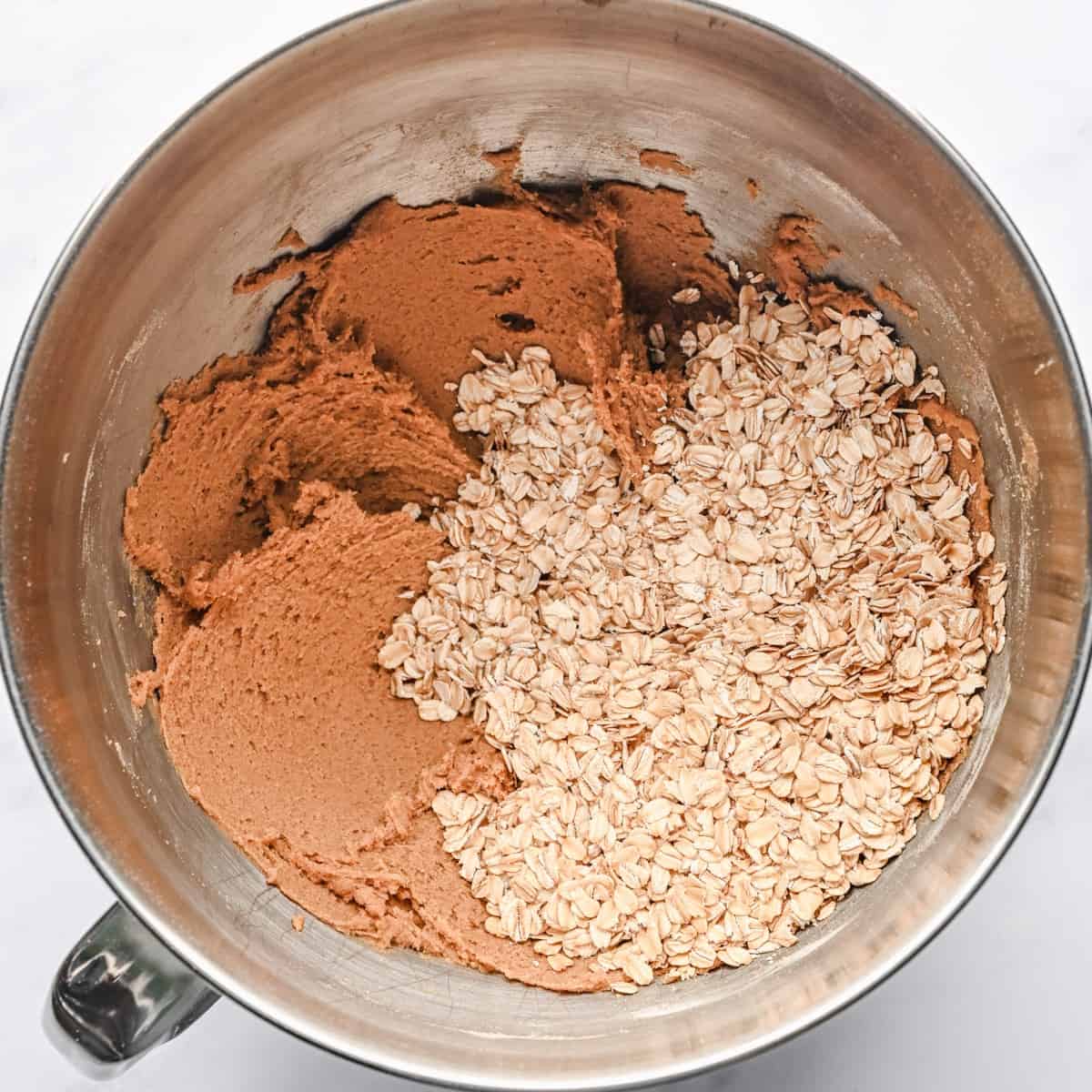 Oats added to the iced oatmeal cookie batter.