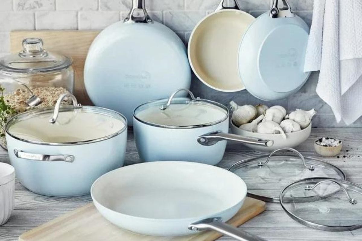 Green pan cookware set in a kitchen setting.
