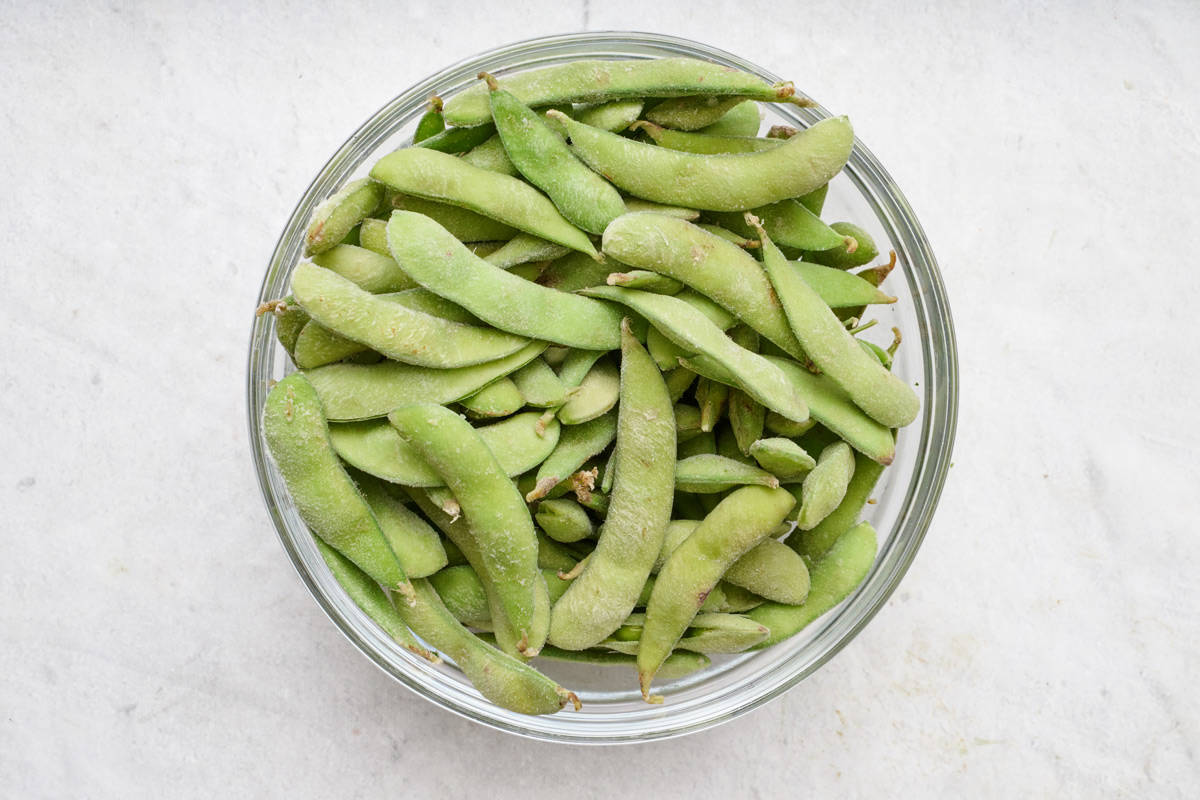 Bowl of edamame pods.