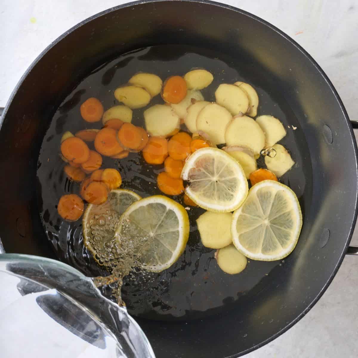 After adding water before simmering.