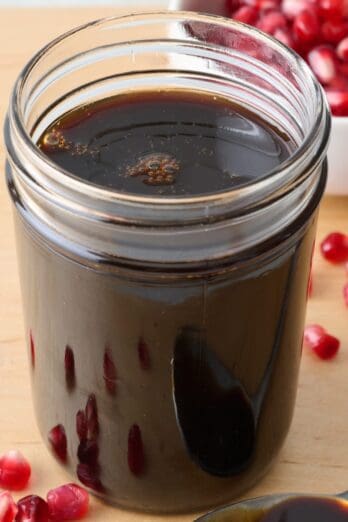 Jar of homemade pomegranate molasses.