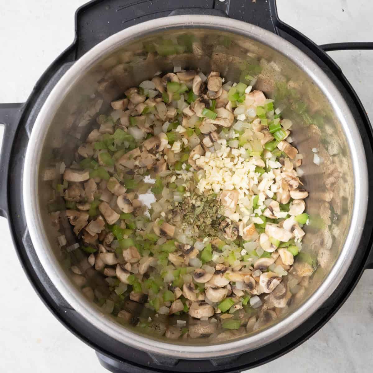 After veggies are cooked with oregano and garlic added.
