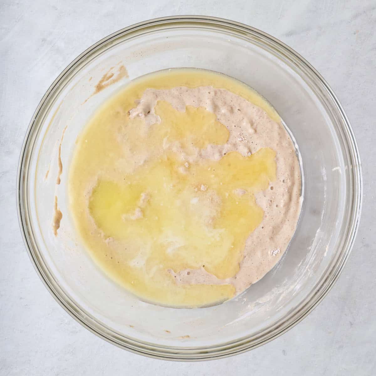 After wet and dry ingredients are combined with melted butter added on top.