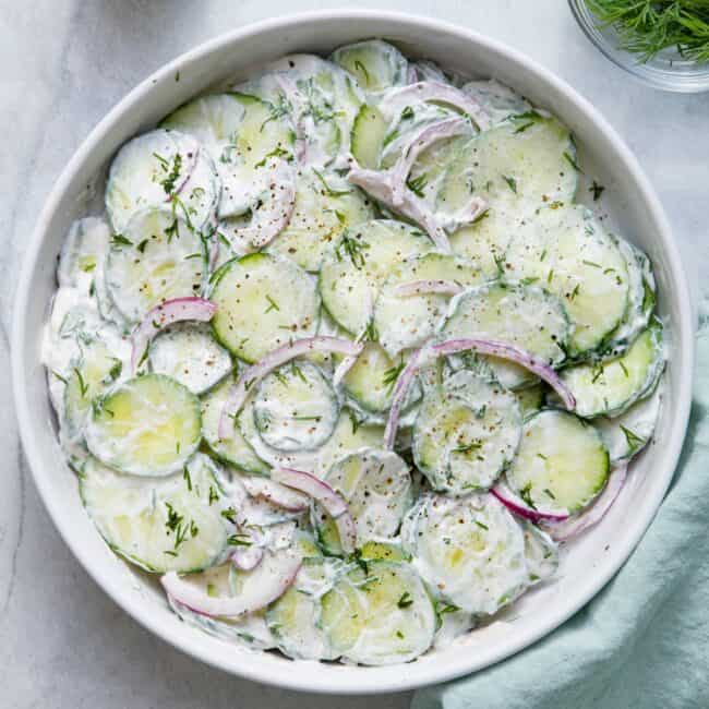 Creamy cucumber salad thumbnail image.