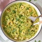 Shrimp pesto pasta in a pot.