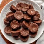 Brownie bites on a white plate.