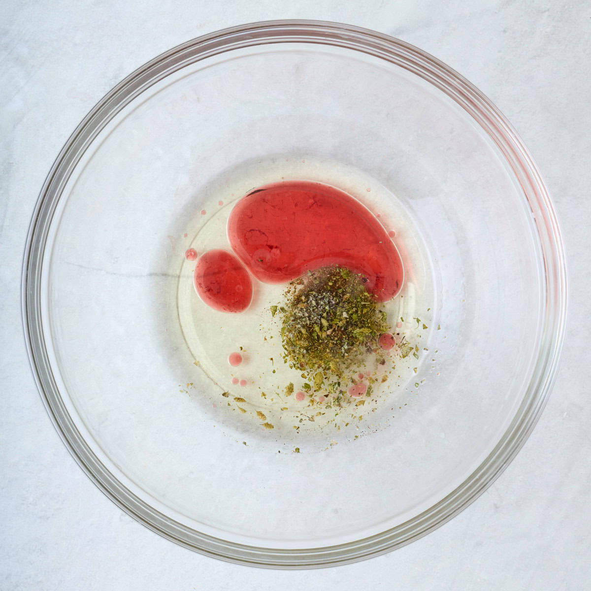 Dressing ingredients in a mixing bowl.