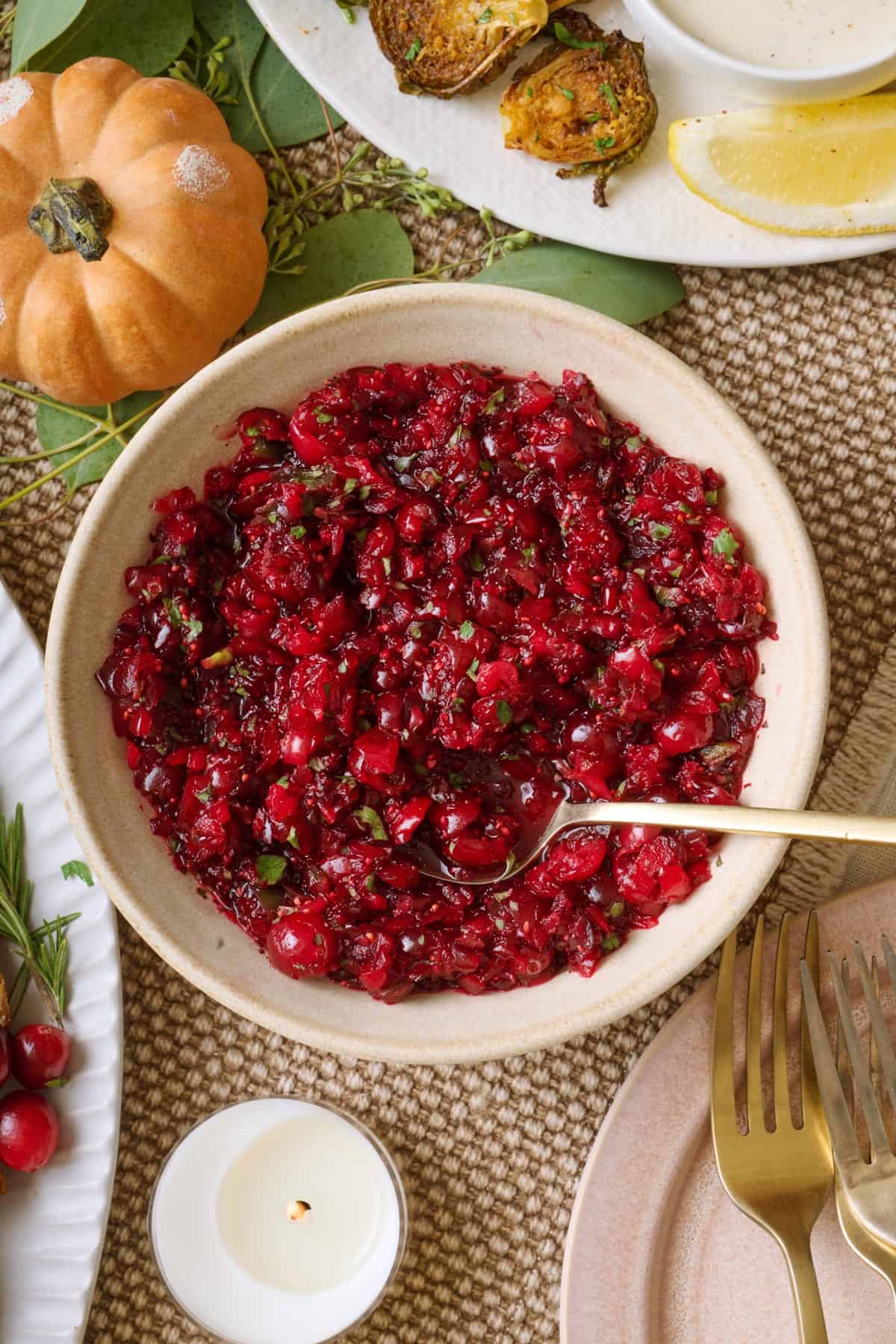 Cranberry salsa on a thanksgiving table spread.