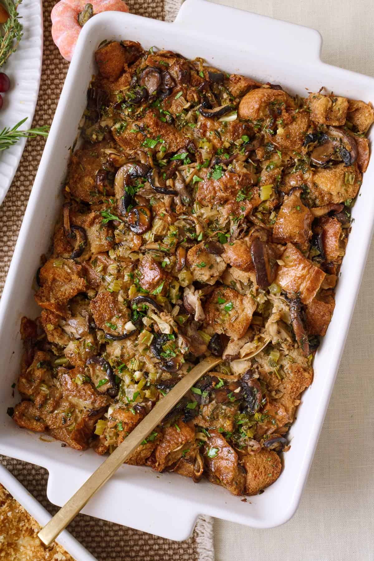 Cooked mushroom stuffing in a baking dish.