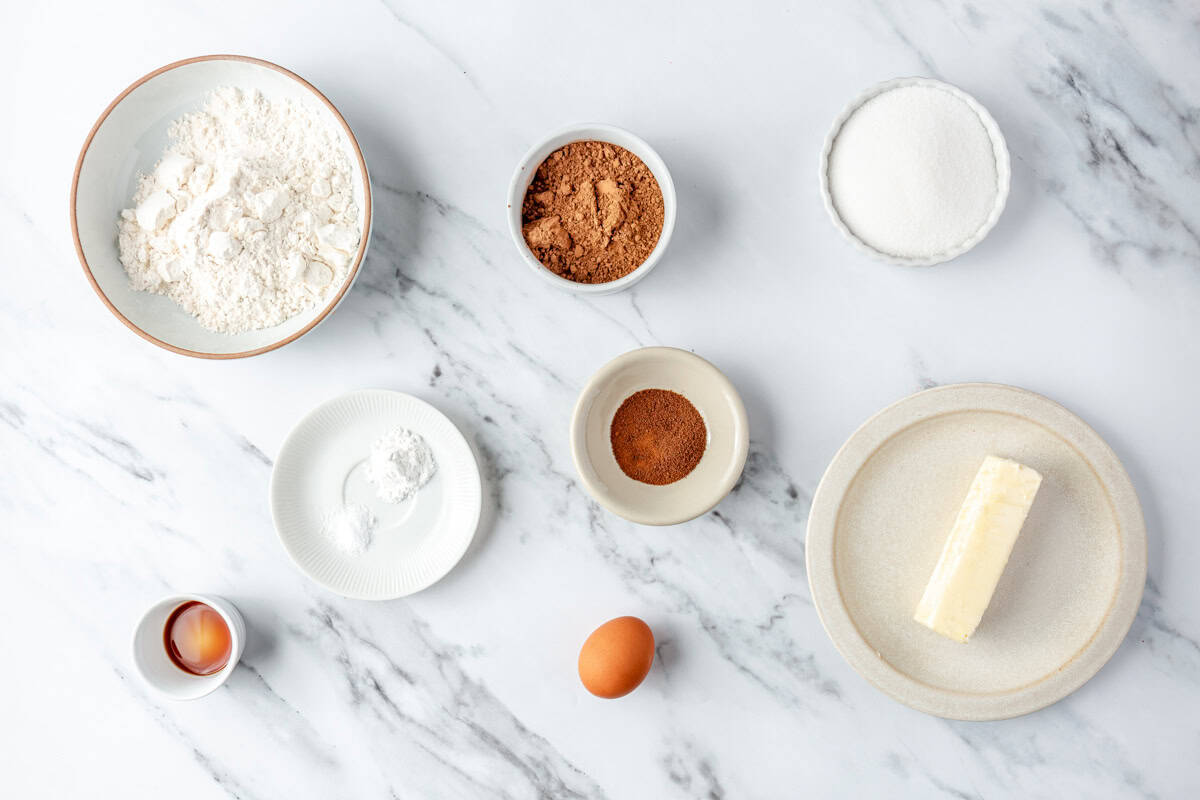 Ingredients for recipe: flour, baking powder, salt, vanilla, cocoa powder, instant coffee, sugar and butter.