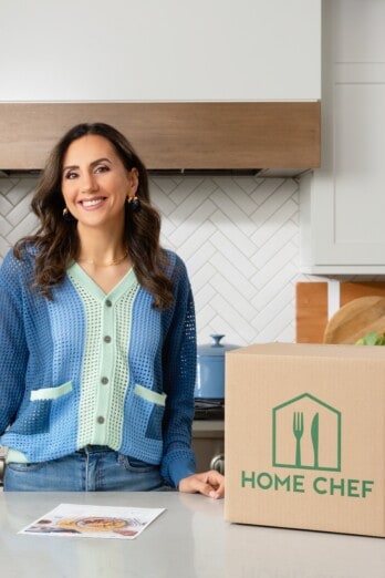 Yumna in her kitchen with Home Chef box