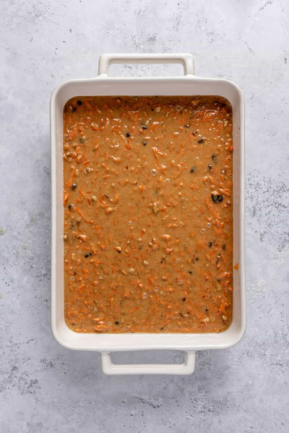 Batter in a prepared baking dish before baking.