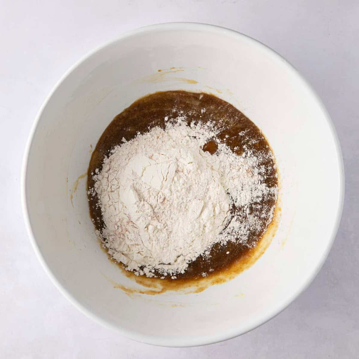 Flour mixture added on top of wet ingredients.
