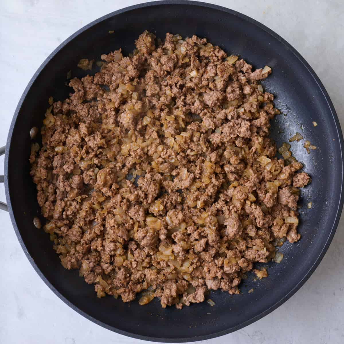 After browning ground beef.