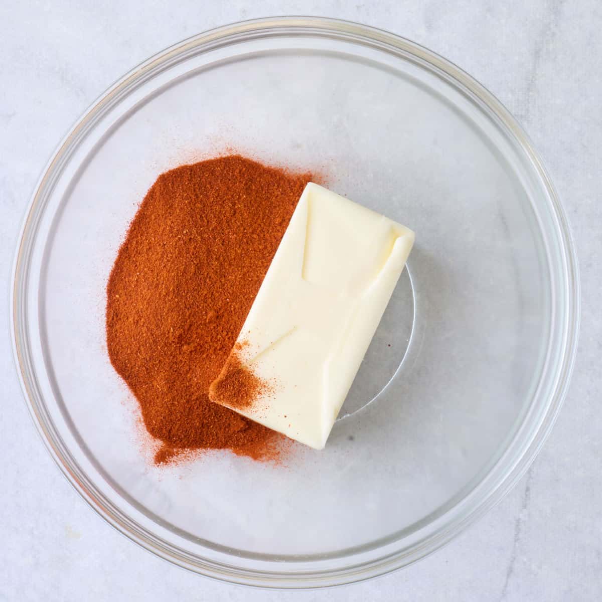 Paprika and butter in a bowl.