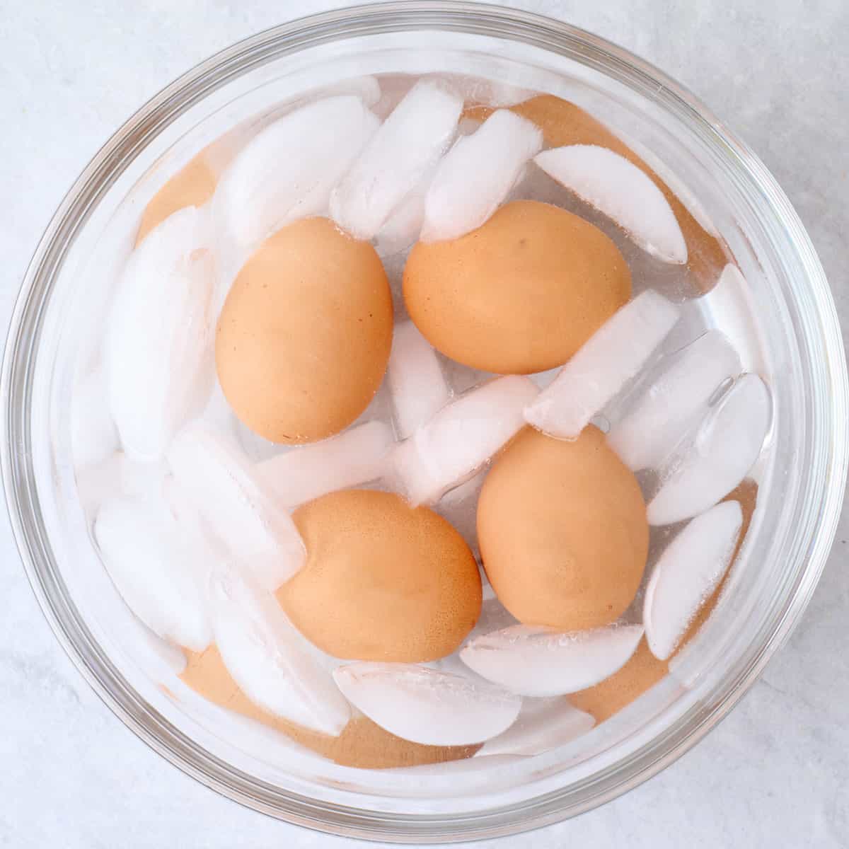 Cooked whole eggs in ice water.