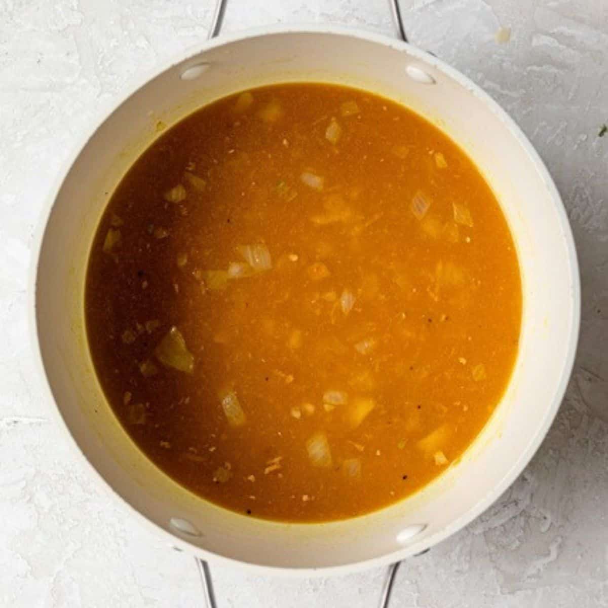 Broth added to pot.