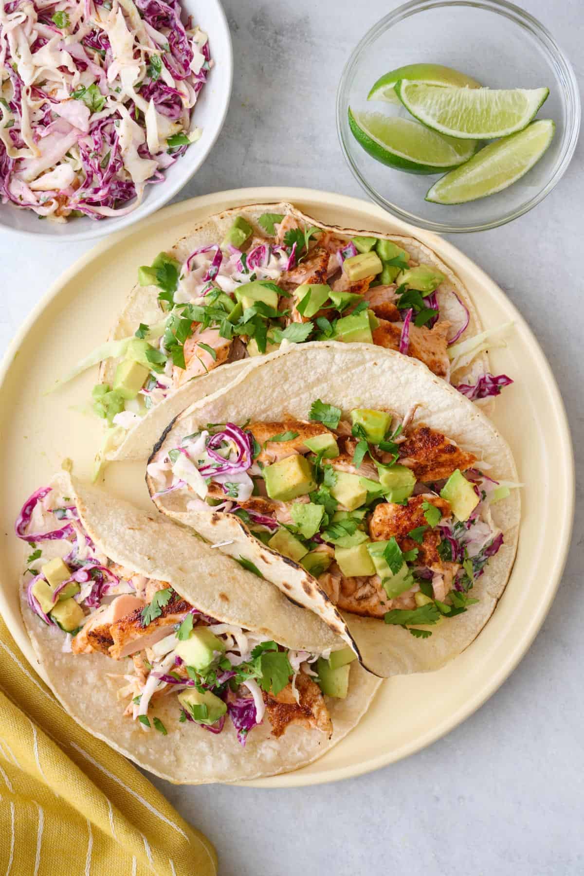 Salmon tacos with fish taco slaw.