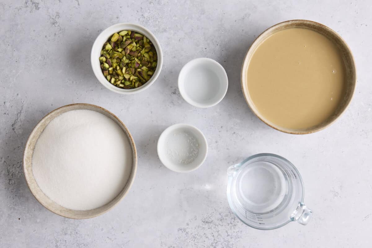 Ingredients for recipe: sugar, pistachios, salt, rose water, water, and tahini.