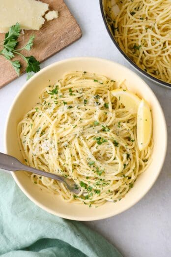 Serving of lemon parmesan pasta in a shallow bowl.
