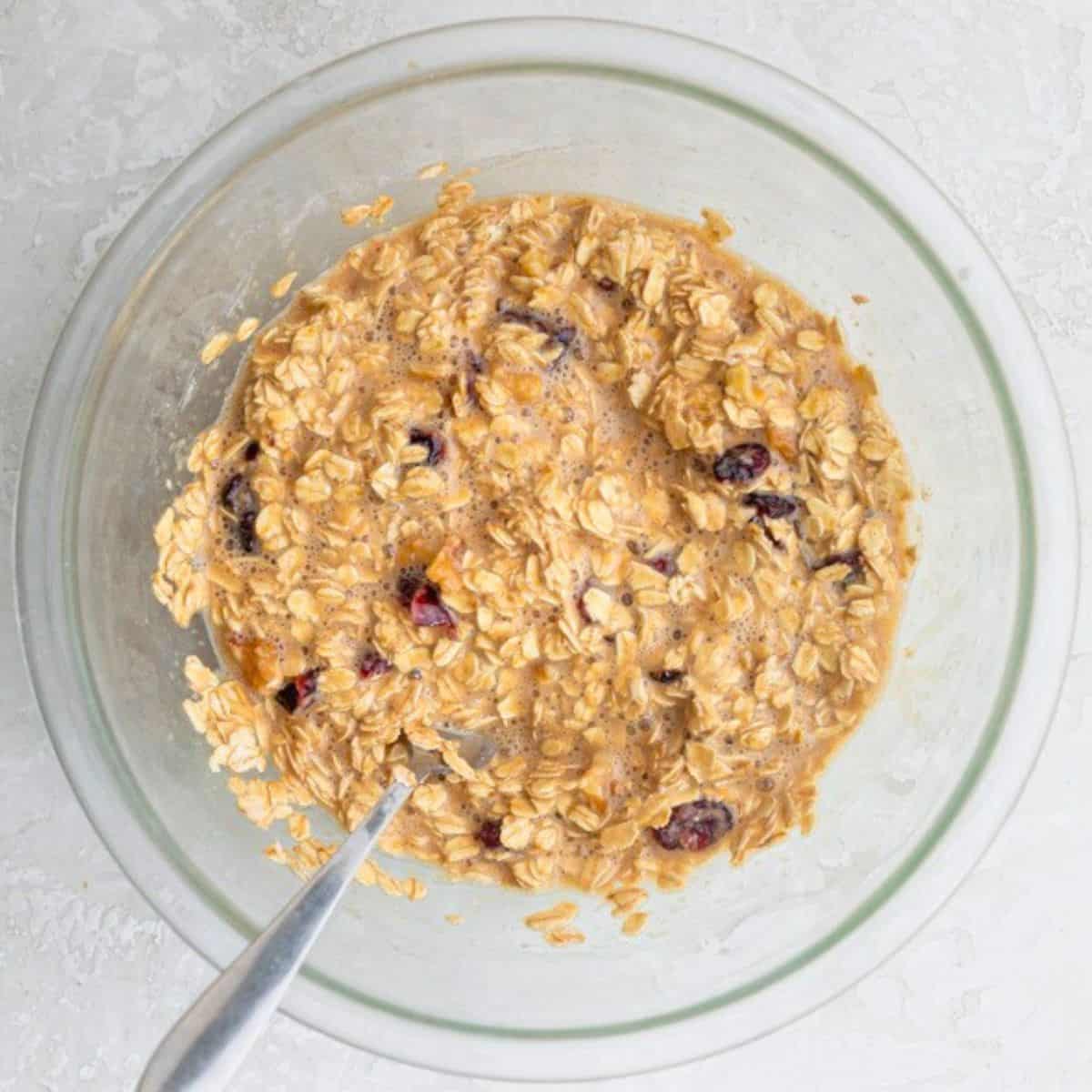 After combining wet and dry ingredients with dried cranberries and walnuts mixed in.