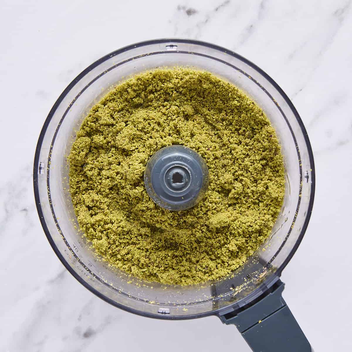 Oil added to food processor.