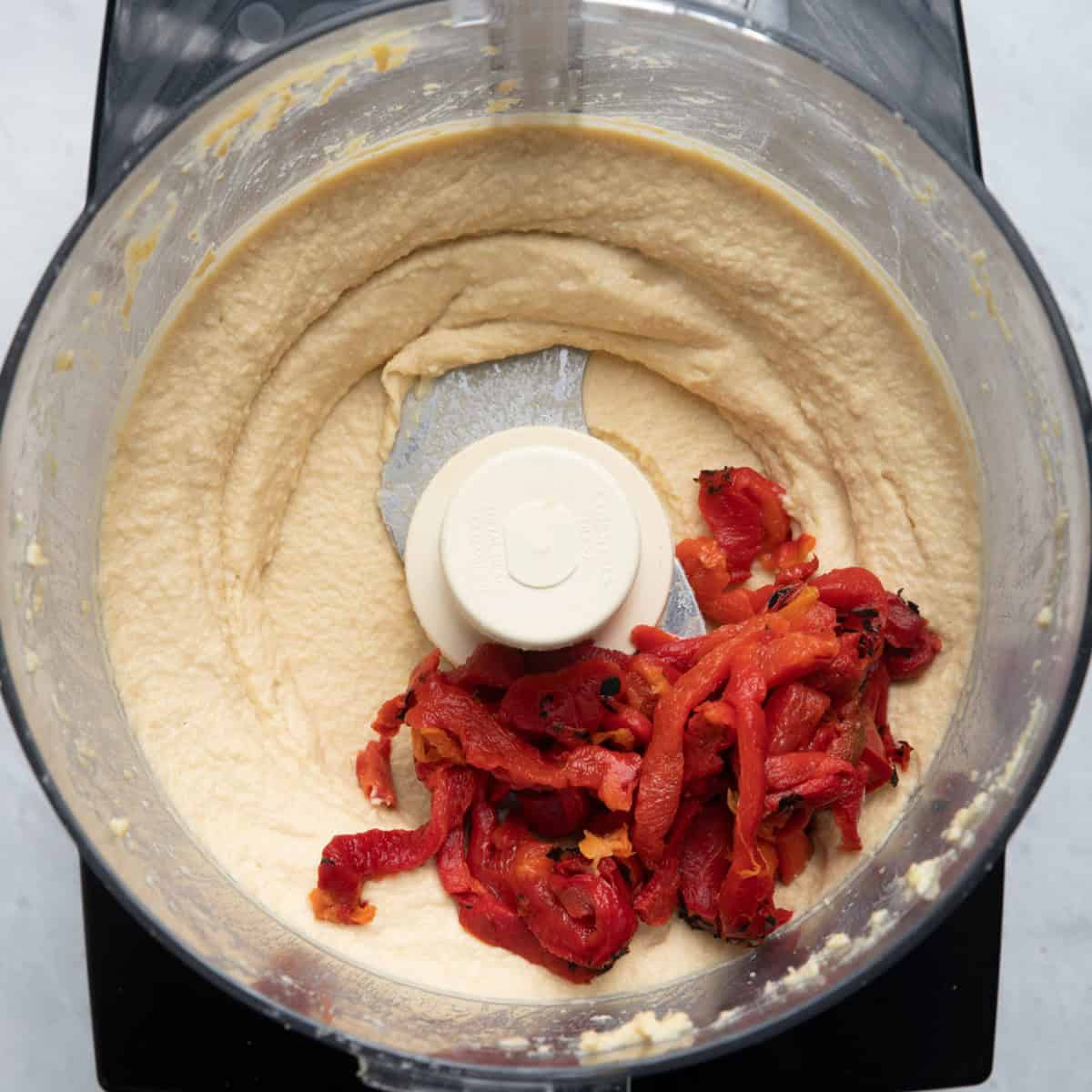 Recipe after blending smooth with roasted red pepper added.