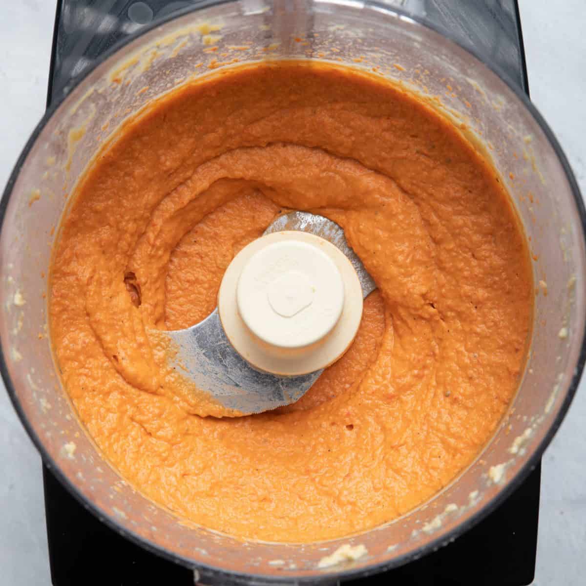 After blending peppers into hummus.