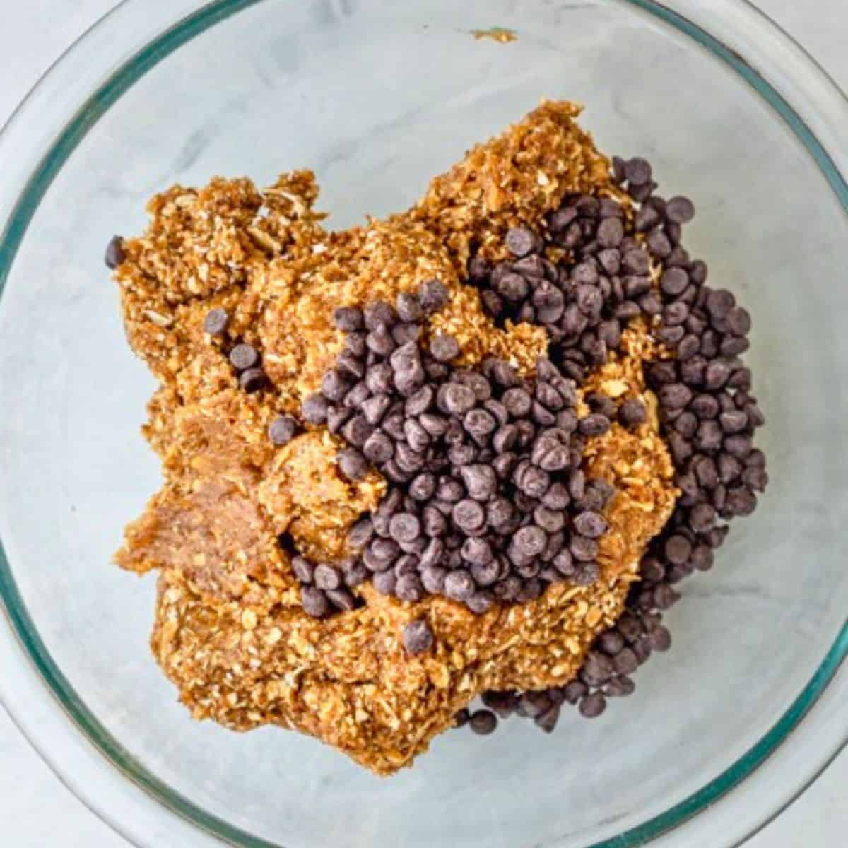 Mixture in a bowl with chocolate chips added.