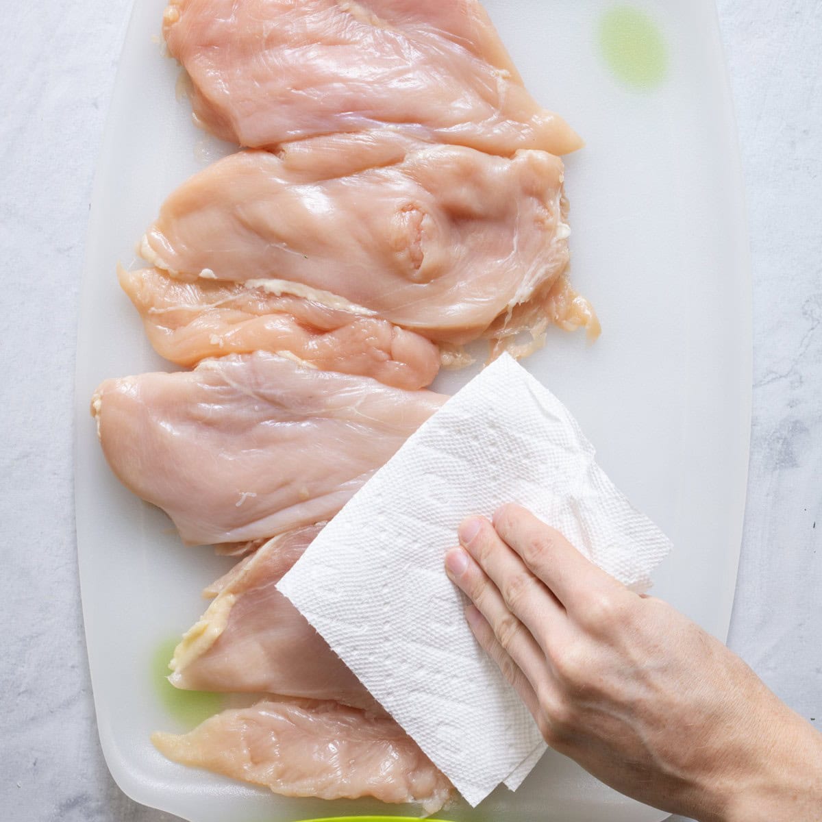 Pat the chicken dry with paper towel.