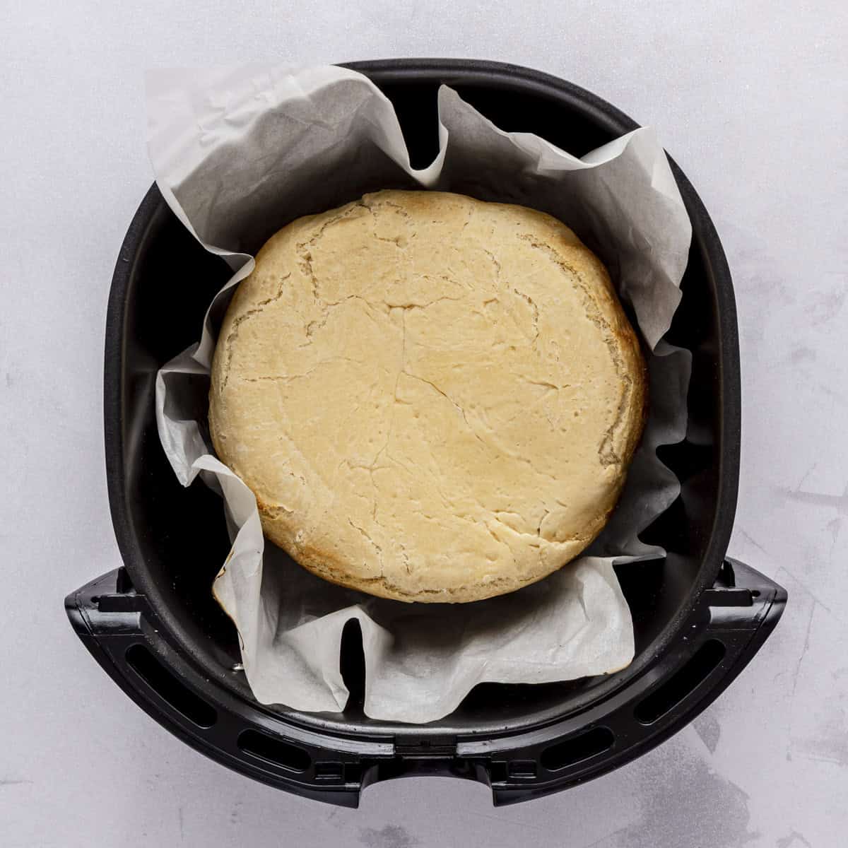 Bread after cooking for 15 minutes and flipped.