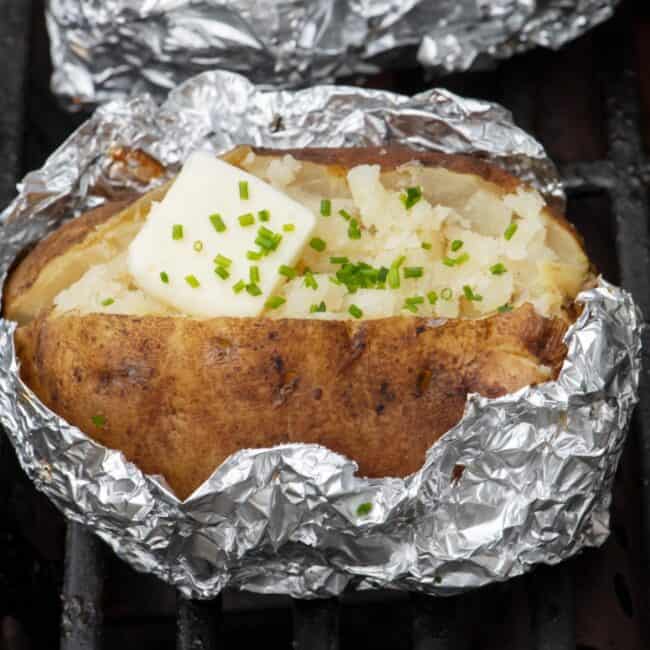 Baked potato on grill recipe.