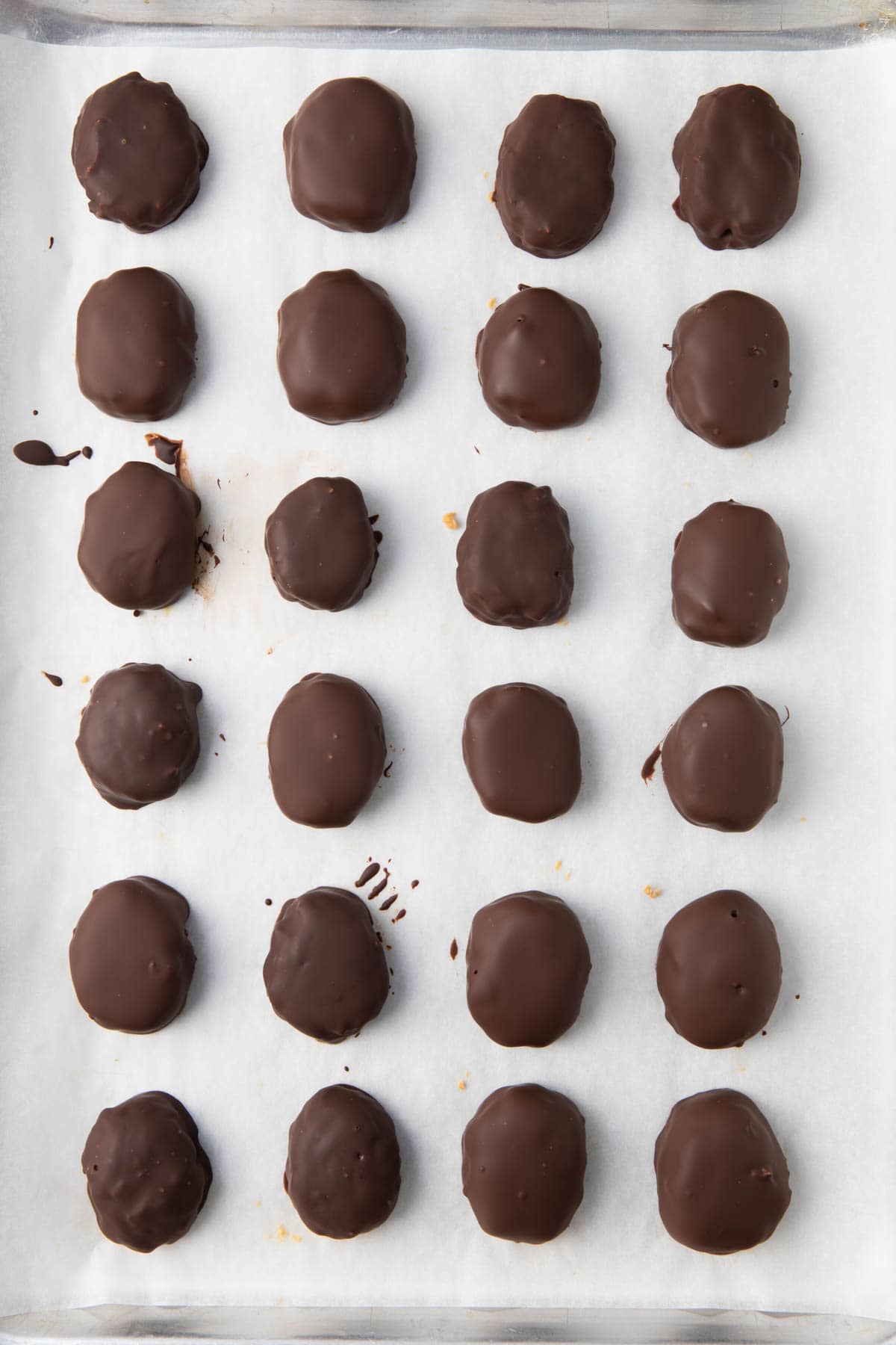 Chocolate peanut butter eggs after chocolate has set.