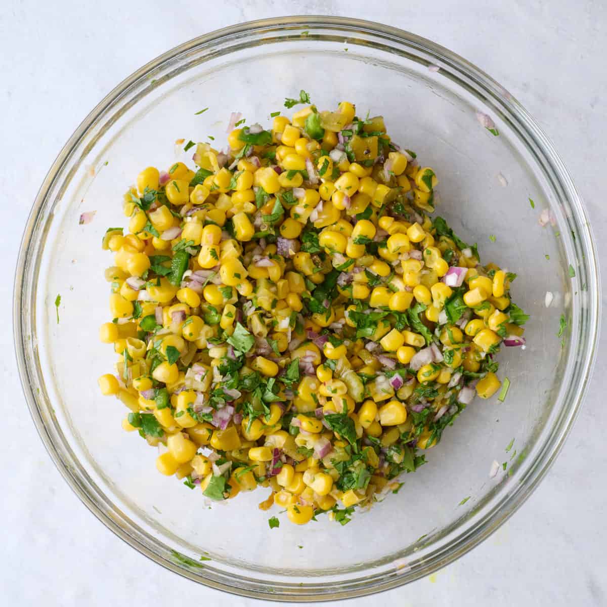 After mixing together corn salsa ingredients in a bowl.