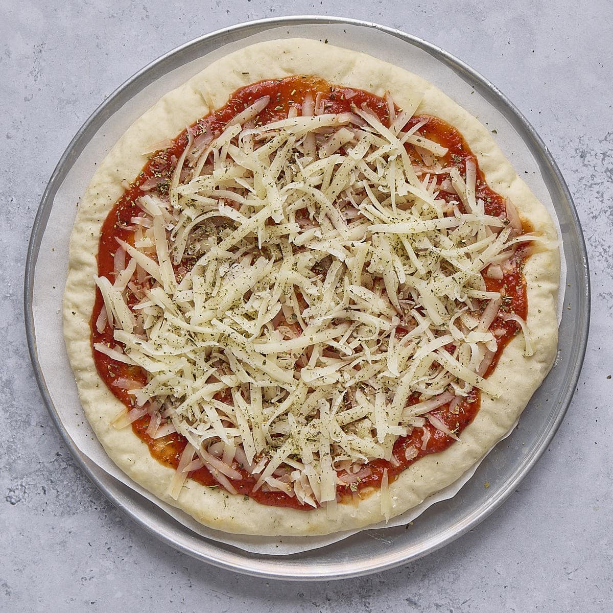 After baking with pizza sauce, cheese and Italian seasoning added.