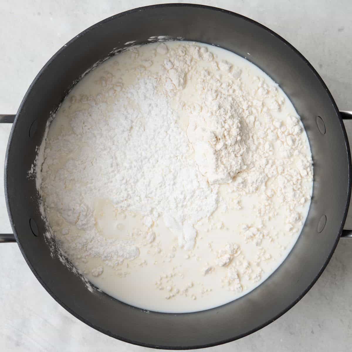 Milk, flour, cornstarch and sugar in saucepan.