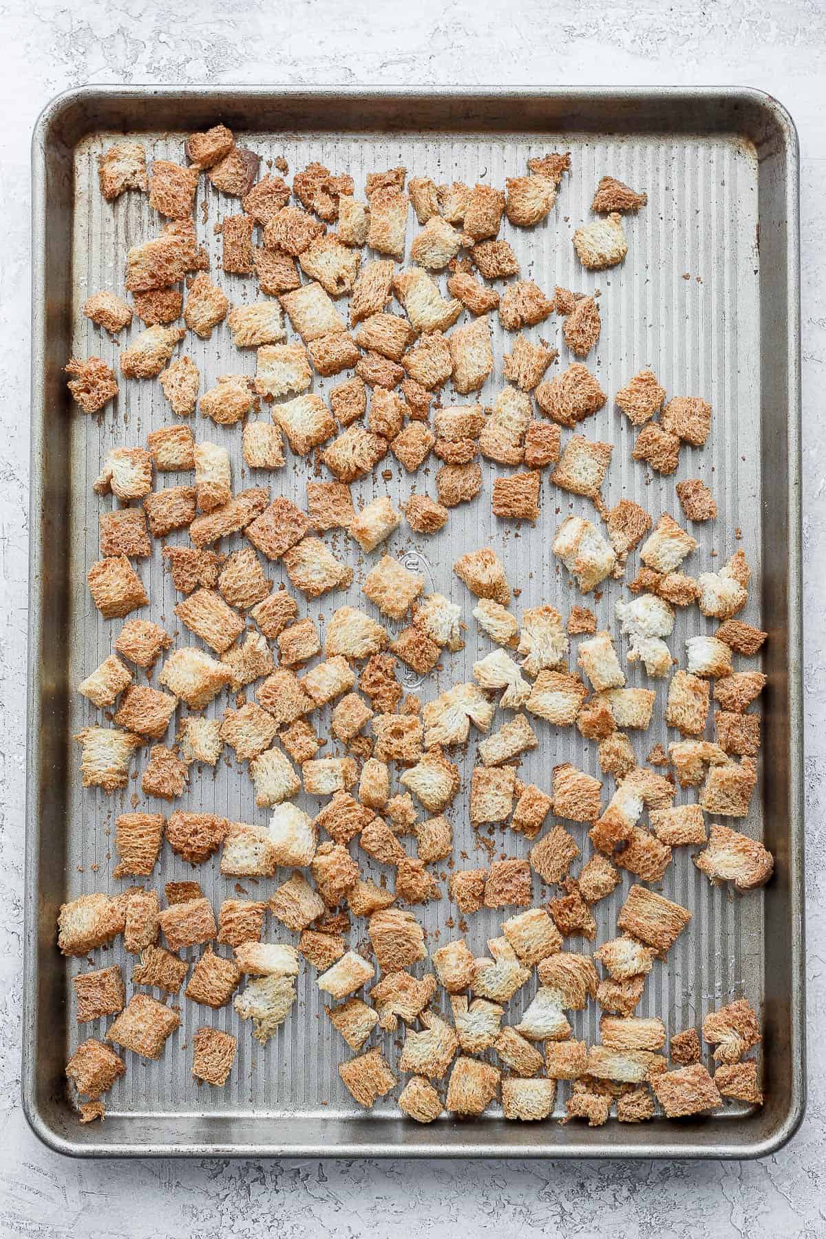 After toasting bread cubes into croutons.