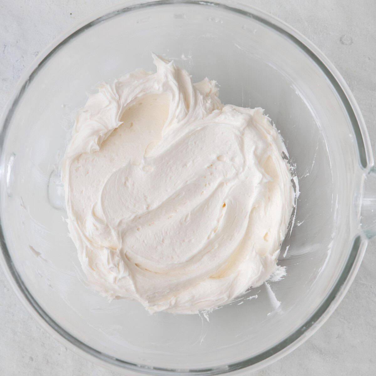 All ingredients combined showing light and fluffy buttercream.