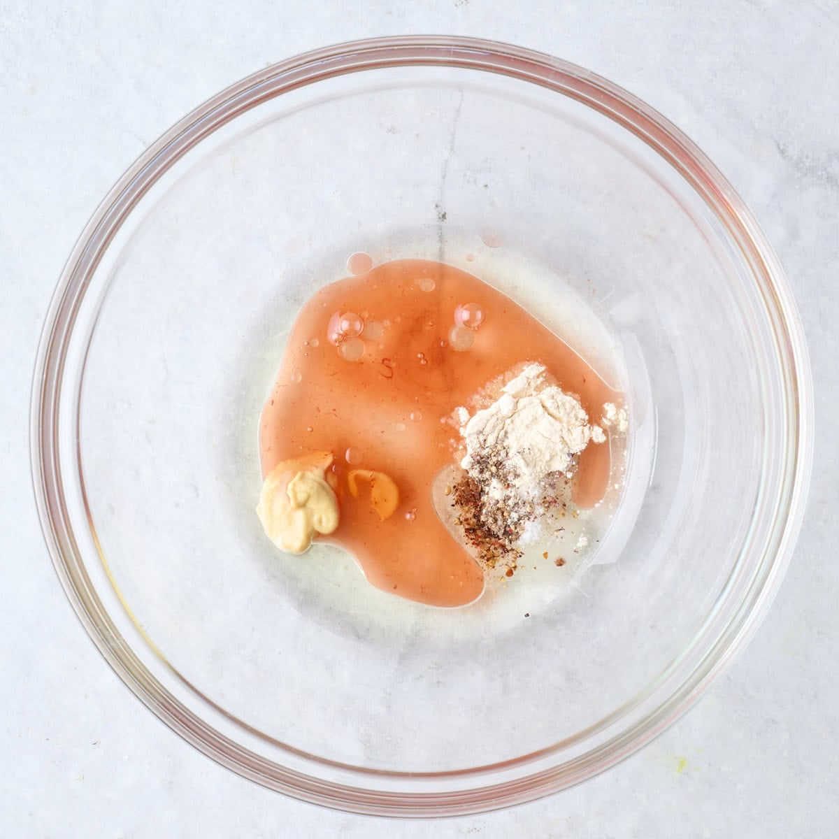 Dressing ingredients in a small bowl.