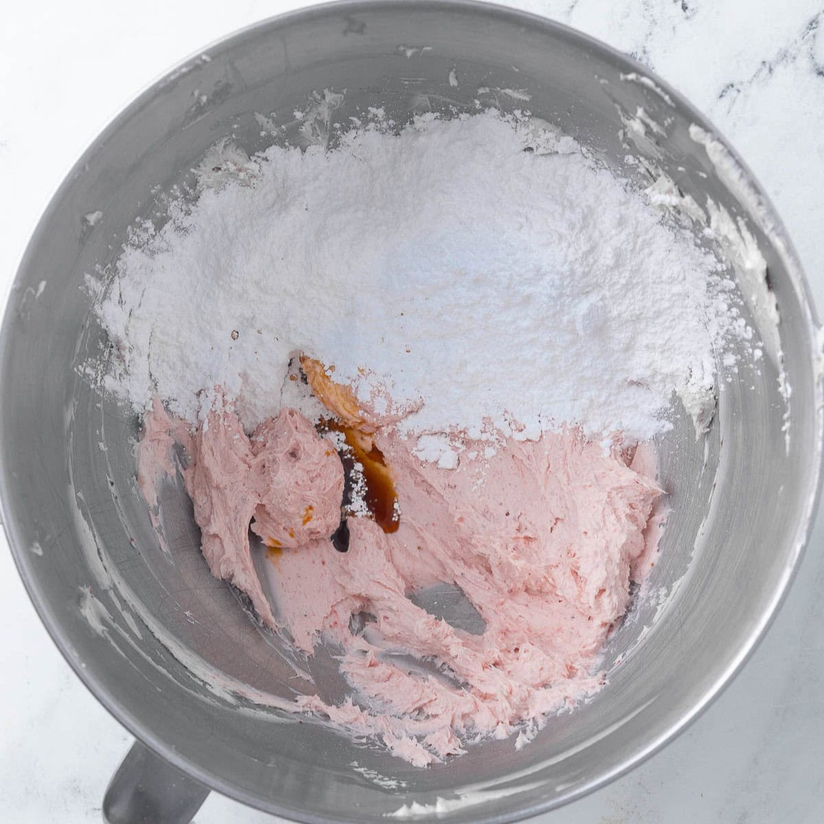 After powder is mixed in with vanilla and powdered sugar added.