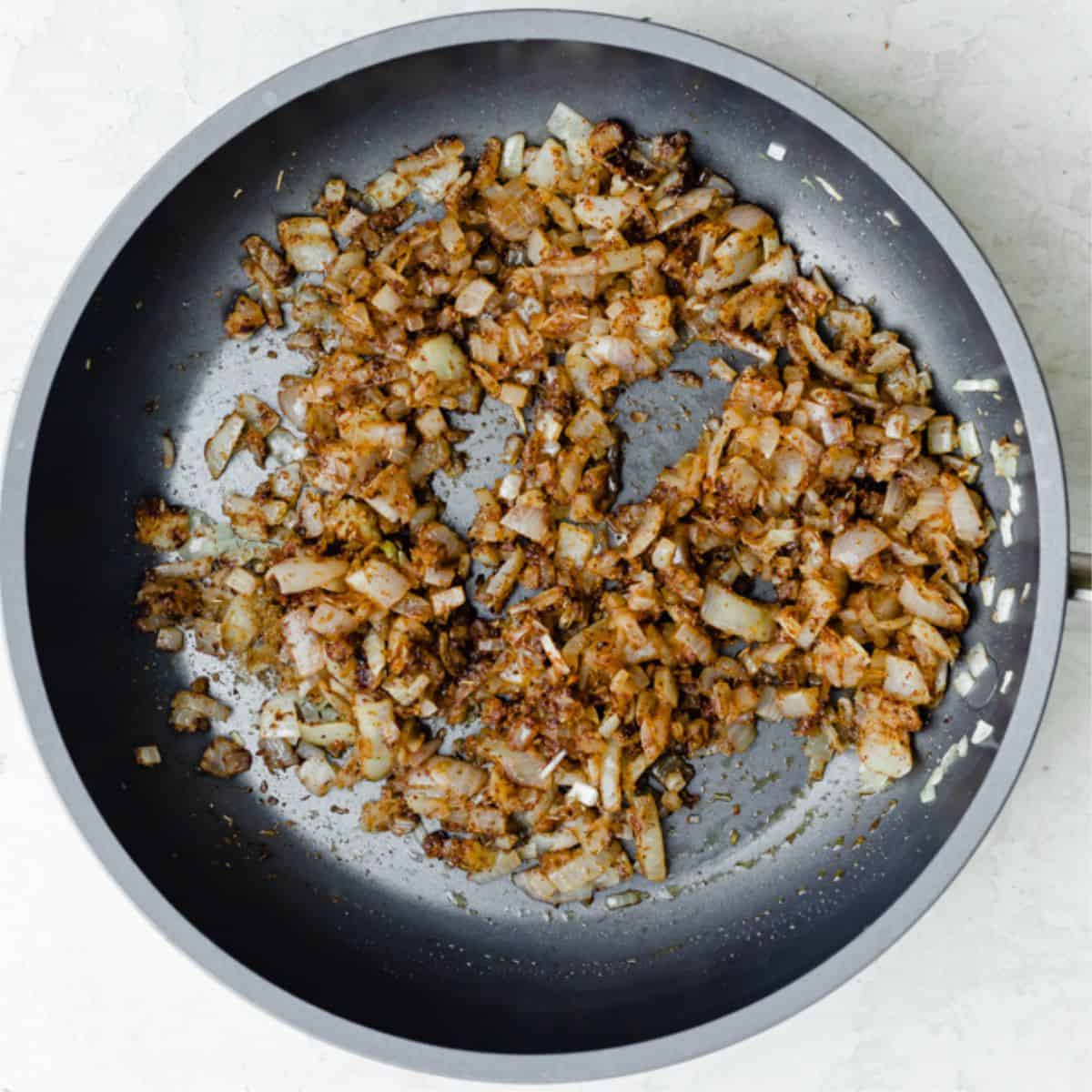 Onions after sautรฉing with seasoning.