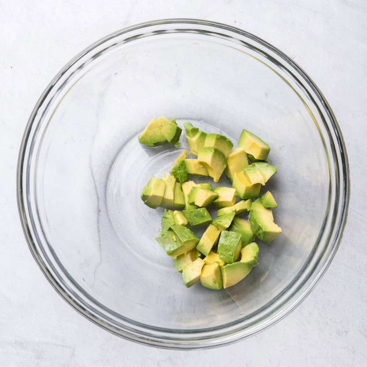 Diced avocado in a bowl.