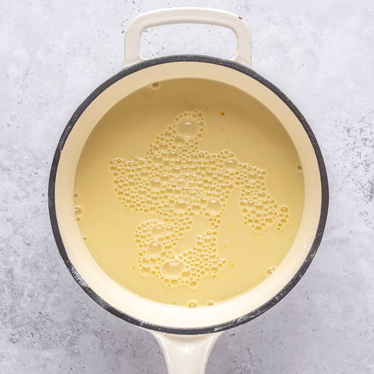 After whisking together, before cooking.