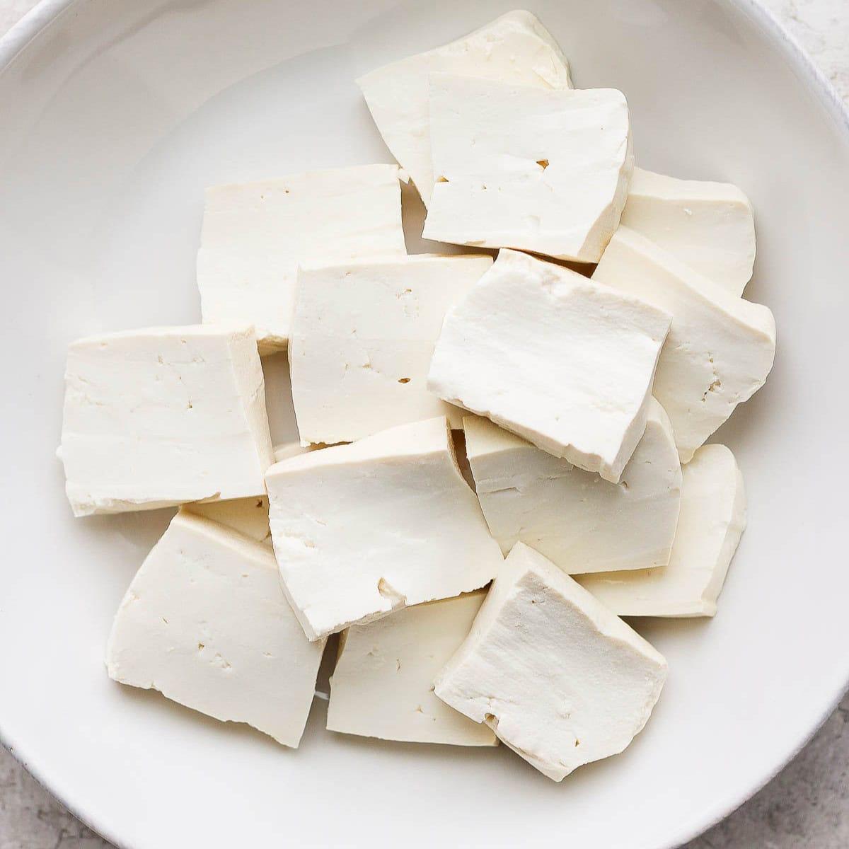 Sliced tofu on a plate.
