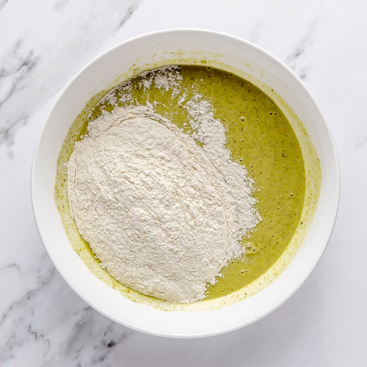 Dry ingredients added to wet mixture.
