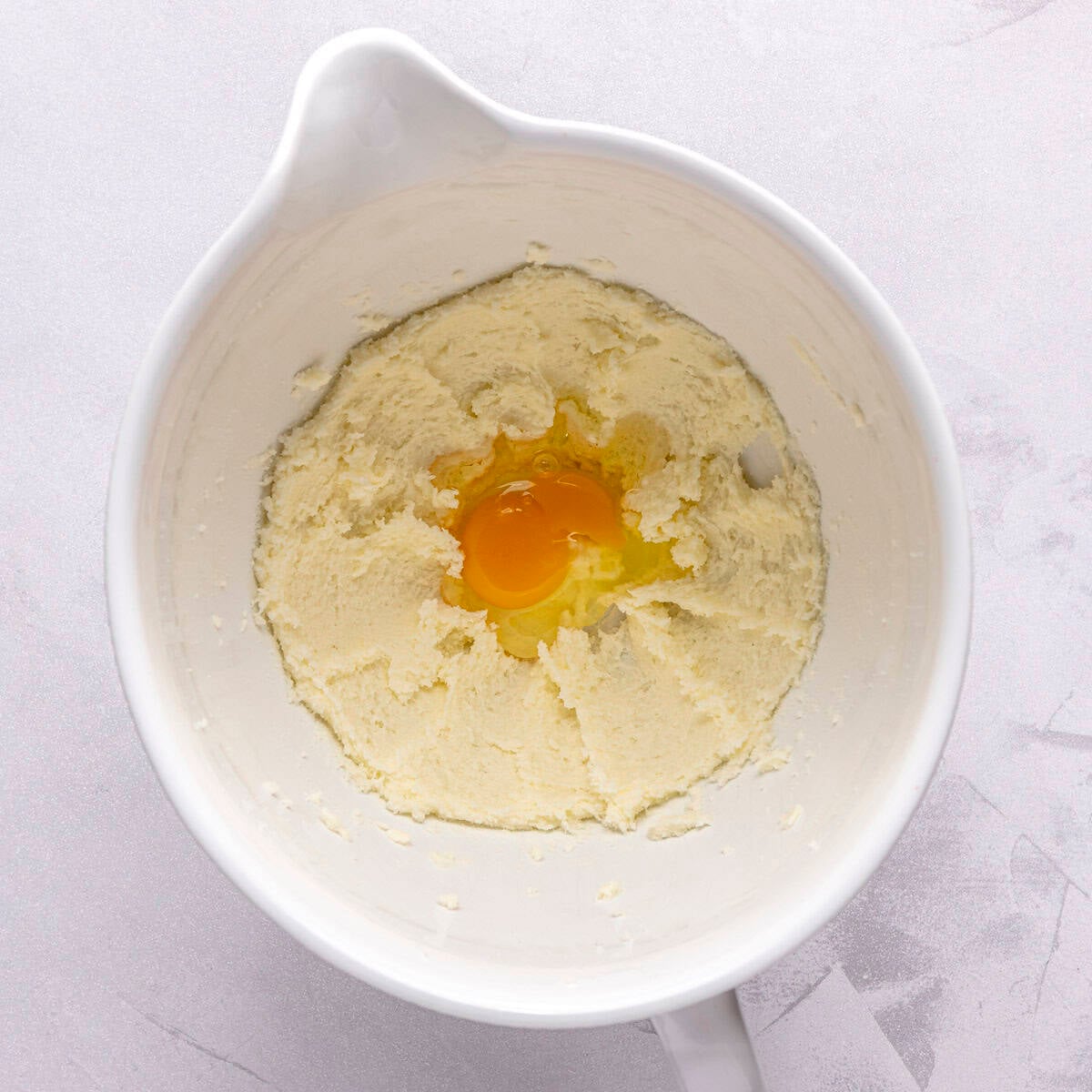 Creamed butter with an egg added.