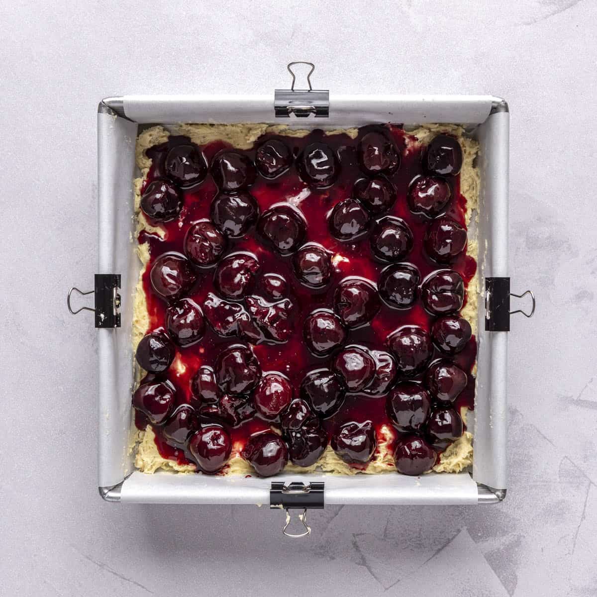 Cherry compote added on top of crust.