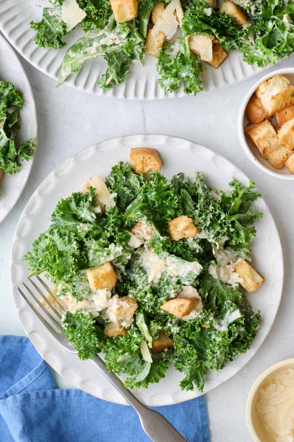 Kale salad with homemade caesar salad and crunchy croutons.