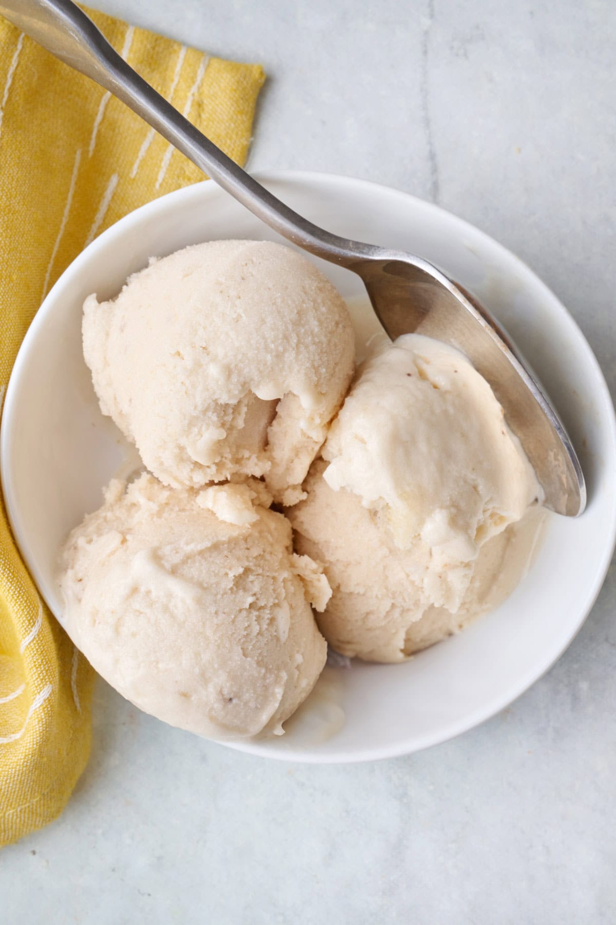 Homemade vanilla protein ice cream in a bowl.