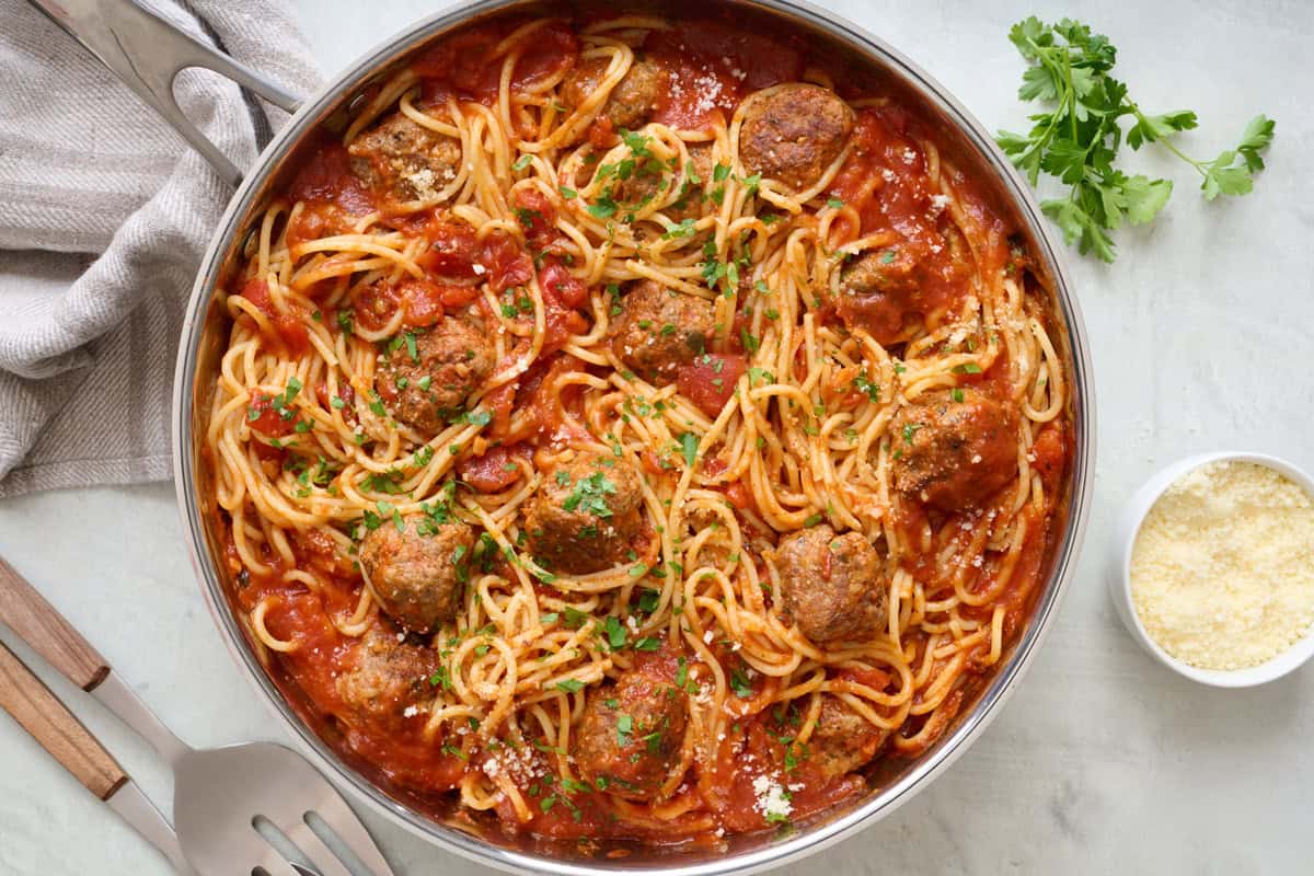 Easy spaghetti and meatballs recipe in a skillet.